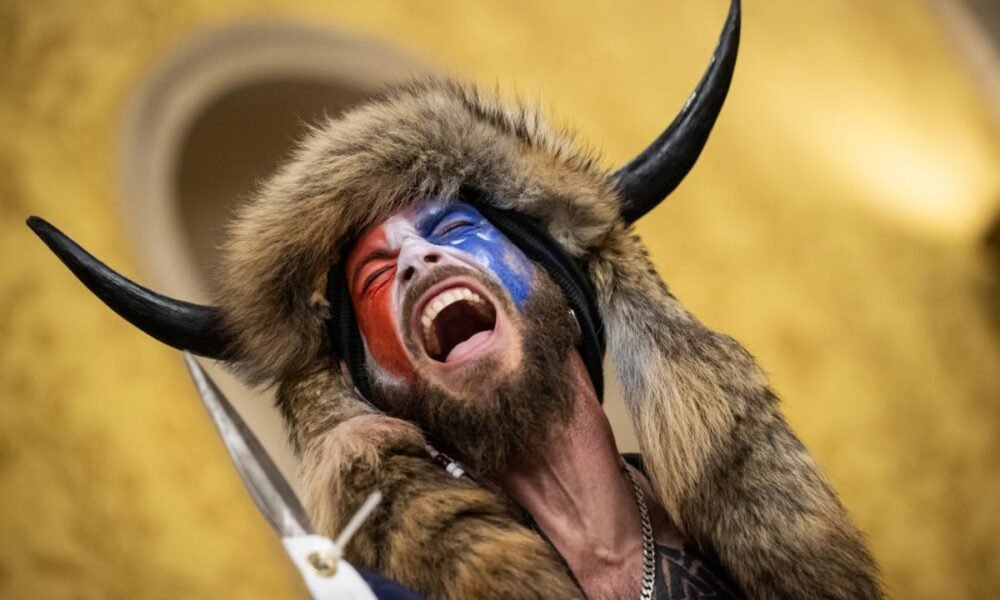 QAnon shaman sues Trump for $40 trillion and targets Musk, T-Mobile and Warner Bros in rambling lawsuit