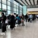 Massive Delays Hit Travelers: Airport Check-In System Crashes! Find Out Why!